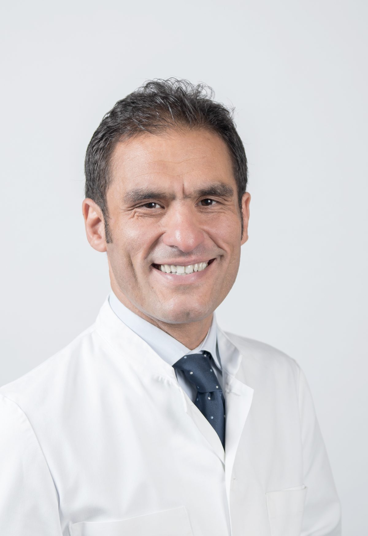 Dr. Ertan Erdoğan, Zahnarzt und Praxisinhaber
